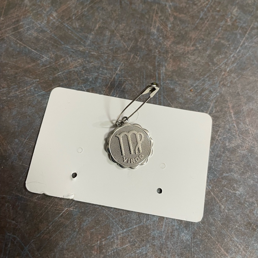 Zodiac sign Virgo silver colored charm